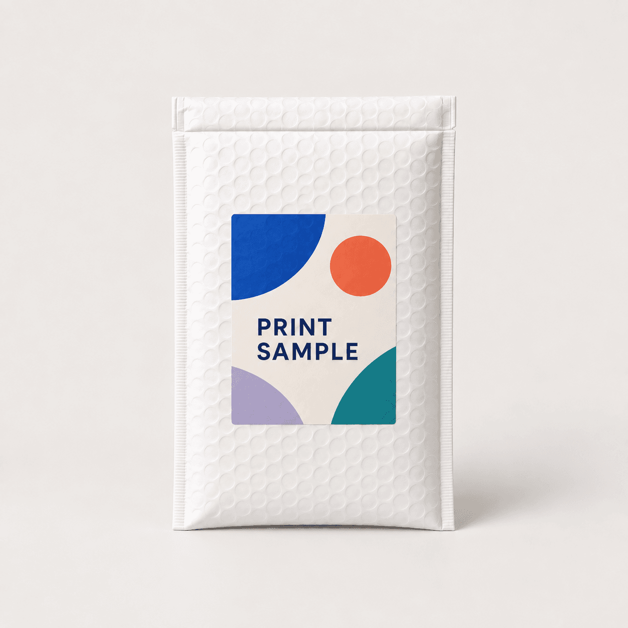 White bubble mailer with a printed brand label